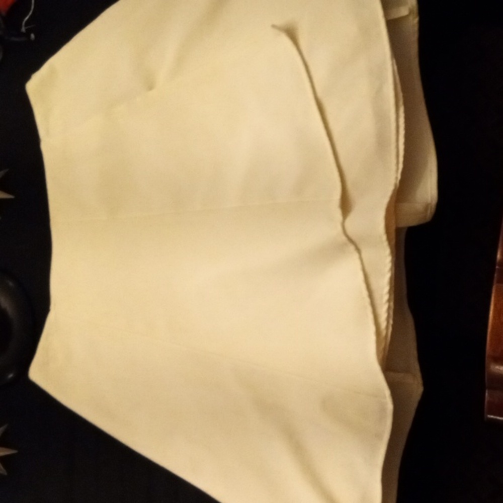 Beige Skirt barely touching the knees